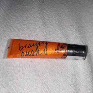 1 NEW Victoria's Secret Beauty Rush Shimmering Orange Lip Gloss Squeeze